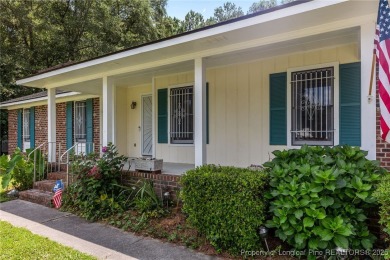 Welcome to this beautifully updated 3-bedroom, 2-bath home in on Hope Mills Golf and Country Club in North Carolina - for sale on GolfHomes.com, golf home, golf lot