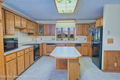 Enjoy clear Teton views from this wonderful home in Golf & on Jackson Hole Golf and Tennis Club in Wyoming - for sale on GolfHomes.com, golf home, golf lot