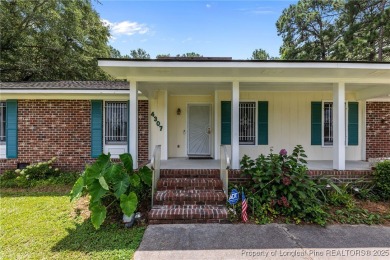 Welcome to this beautifully updated 3-bedroom, 2-bath home in on Hope Mills Golf and Country Club in North Carolina - for sale on GolfHomes.com, golf home, golf lot