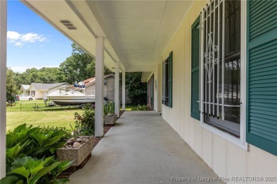 Welcome to this beautifully updated 3-bedroom, 2-bath home in on Hope Mills Golf and Country Club in North Carolina - for sale on GolfHomes.com, golf home, golf lot
