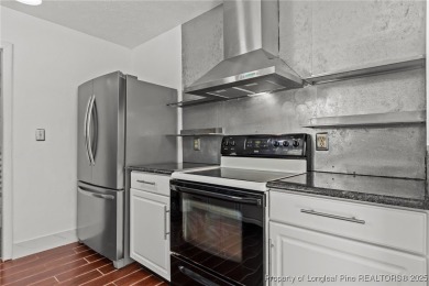 Welcome to this beautifully updated 3-bedroom, 2-bath home in on Hope Mills Golf and Country Club in North Carolina - for sale on GolfHomes.com, golf home, golf lot