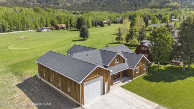 This stunning custom-built home sits on a generous lot right on on Star Valley RV Golf Course in Wyoming - for sale on GolfHomes.com, golf home, golf lot