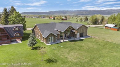 This stunning custom-built home sits on a generous lot right on on Star Valley RV Golf Course in Wyoming - for sale on GolfHomes.com, golf home, golf lot