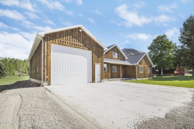 This stunning custom-built home sits on a generous lot right on on Star Valley RV Golf Course in Wyoming - for sale on GolfHomes.com, golf home, golf lot