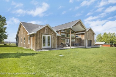 This stunning custom-built home sits on a generous lot right on on Star Valley RV Golf Course in Wyoming - for sale on GolfHomes.com, golf home, golf lot