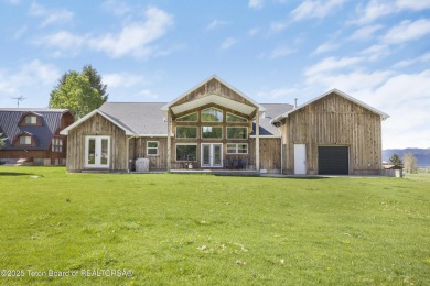 This stunning custom-built home sits on a generous lot right on on Star Valley RV Golf Course in Wyoming - for sale on GolfHomes.com, golf home, golf lot