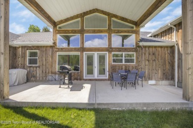 This stunning custom-built home sits on a generous lot right on on Star Valley RV Golf Course in Wyoming - for sale on GolfHomes.com, golf home, golf lot