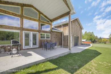 This stunning custom-built home sits on a generous lot right on on Star Valley RV Golf Course in Wyoming - for sale on GolfHomes.com, golf home, golf lot
