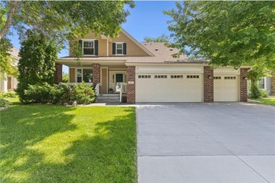 Stunning 5-bed, 4-bath home with a 3-car garage in Blaine's on TPC of the Twin Cities in Minnesota - for sale on GolfHomes.com, golf home, golf lot