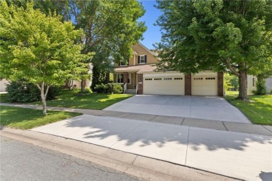 Stunning 5-bed, 4-bath home with a 3-car garage in Blaine's on TPC of the Twin Cities in Minnesota - for sale on GolfHomes.com, golf home, golf lot