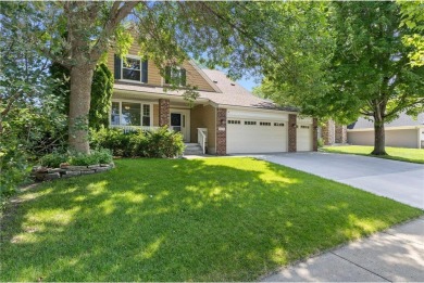 Stunning 5-bed, 4-bath home with a 3-car garage in Blaine's on TPC of the Twin Cities in Minnesota - for sale on GolfHomes.com, golf home, golf lot