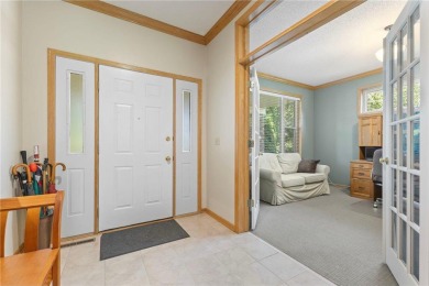 Stunning 5-bed, 4-bath home with a 3-car garage in Blaine's on TPC of the Twin Cities in Minnesota - for sale on GolfHomes.com, golf home, golf lot