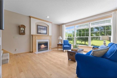 Stunning 5-bed, 4-bath home with a 3-car garage in Blaine's on TPC of the Twin Cities in Minnesota - for sale on GolfHomes.com, golf home, golf lot