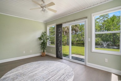 Elegant Ranch-Style Home with Serene Pond Views--Minutes from on Sandpiper Bay Golf and Country Club in North Carolina - for sale on GolfHomes.com, golf home, golf lot