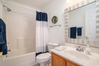 Elegant Ranch-Style Home with Serene Pond Views--Minutes from on Sandpiper Bay Golf and Country Club in North Carolina - for sale on GolfHomes.com, golf home, golf lot