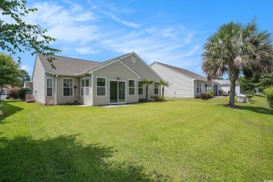 Elegant Ranch-Style Home with Serene Pond Views--Minutes from on Sandpiper Bay Golf and Country Club in North Carolina - for sale on GolfHomes.com, golf home, golf lot