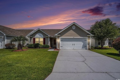Elegant Ranch-Style Home with Serene Pond Views--Minutes from on Sandpiper Bay Golf and Country Club in North Carolina - for sale on GolfHomes.com, golf home, golf lot