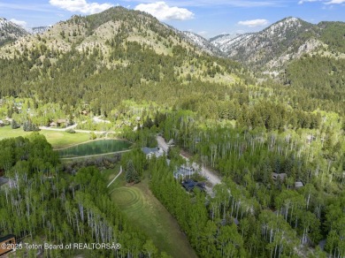 Discover mountain living at its finest with this stunning home on Star Valley RV Golf Course in Wyoming - for sale on GolfHomes.com, golf home, golf lot