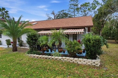 Sweet and solid Sugarmill home featuring a desirable split 2/2 on Sugarmill Woods Golf and Country Club in Florida - for sale on GolfHomes.com, golf home, golf lot