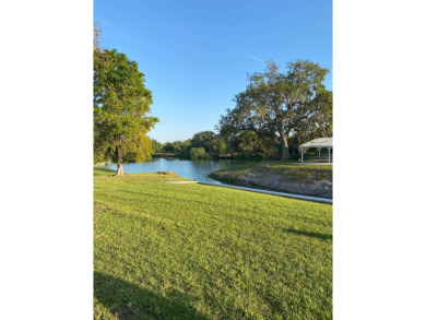 1985 Twin 1,296 Sq. Ft. double wide (27x48) is bright and on Grasslands Golf and Country Club in Florida - for sale on GolfHomes.com, golf home, golf lot
