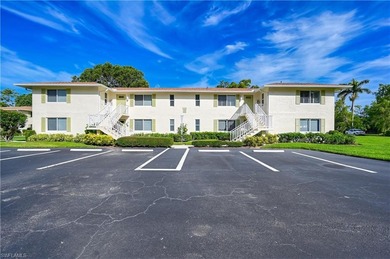 This second floor end-unit is a must see! It features a on The Glades Golf and Country Club in Florida - for sale on GolfHomes.com, golf home, golf lot