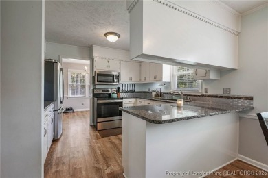 Welcome to this Gray's Creek tri-level cutie! On the main floor on Cypress Lakes Golf Course in North Carolina - for sale on GolfHomes.com, golf home, golf lot