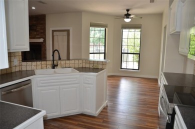 Terrific 3-Bedroom, 2-Bath Home with Pool and Outdoor Kitchen on Shady Oaks Golf Course in Texas - for sale on GolfHomes.com, golf home, golf lot