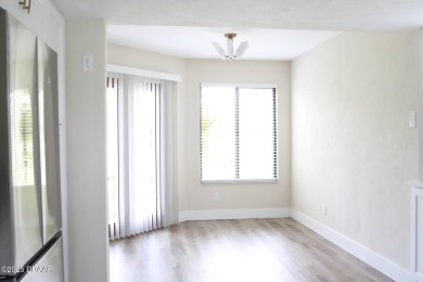 LUXURY IN GATED GOLF COMMUNITY - 3BR/2BA END UNIT | 128-B Golden on The Club At Pelican Bay - North Course in Florida - for sale on GolfHomes.com, golf home, golf lot