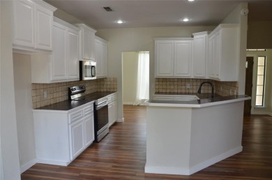 Terrific 3-Bedroom, 2-Bath Home with Pool and Outdoor Kitchen on Shady Oaks Golf Course in Texas - for sale on GolfHomes.com, golf home, golf lot