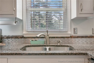 Welcome to this Gray's Creek tri-level cutie! On the main floor on Cypress Lakes Golf Course in North Carolina - for sale on GolfHomes.com, golf home, golf lot