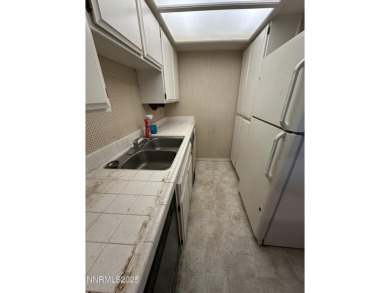 Ground floor unit with easy access to Diamond Peak Ski Resort on Incline Village Golf Course in Nevada - for sale on GolfHomes.com, golf home, golf lot