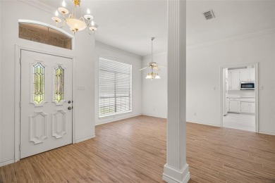 This comfortable 3-2.5-2 home with golf cart space is tucked on Nutcracker Golf Club in Texas - for sale on GolfHomes.com, golf home, golf lot
