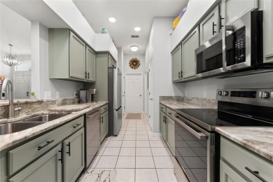 Discover this meticulously maintained 3-bedroom, 2-bathroom home on Huntington Hills Golf and Country Club in Florida - for sale on GolfHomes.com, golf home, golf lot