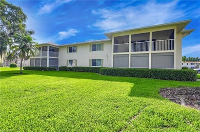 This second floor end-unit is a must see! It features a on The Glades Golf and Country Club in Florida - for sale on GolfHomes.com, golf home, golf lot
