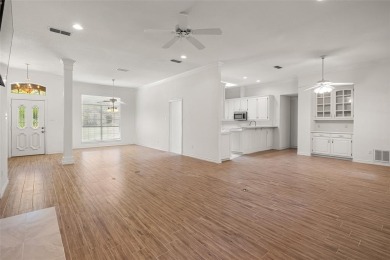 This comfortable 3-2.5-2 home with golf cart space is tucked on Nutcracker Golf Club in Texas - for sale on GolfHomes.com, golf home, golf lot