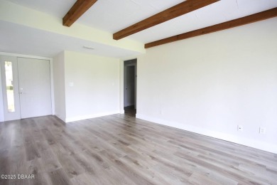 LUXURY IN GATED GOLF COMMUNITY - 3BR/2BA END UNIT | 128-B Golden on The Club At Pelican Bay - North Course in Florida - for sale on GolfHomes.com, golf home, golf lot