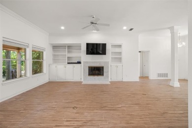 This comfortable 3-2.5-2 home with golf cart space is tucked on Nutcracker Golf Club in Texas - for sale on GolfHomes.com, golf home, golf lot