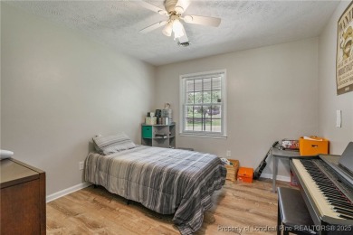Welcome to this Gray's Creek tri-level cutie! On the main floor on Cypress Lakes Golf Course in North Carolina - for sale on GolfHomes.com, golf home, golf lot