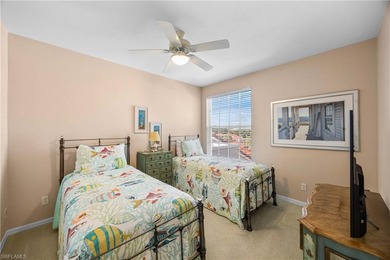 Perched high above it all, this rare end-unit penthouse offers on Pelican Marsh Golf Club in Florida - for sale on GolfHomes.com, golf home, golf lot