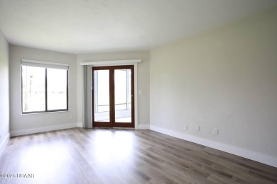 LUXURY IN GATED GOLF COMMUNITY - 3BR/2BA END UNIT | 128-B Golden on The Club At Pelican Bay - North Course in Florida - for sale on GolfHomes.com, golf home, golf lot