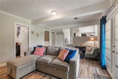 Welcome to this Gray's Creek tri-level cutie! On the main floor on Cypress Lakes Golf Course in North Carolina - for sale on GolfHomes.com, golf home, golf lot