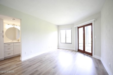 LUXURY IN GATED GOLF COMMUNITY - 3BR/2BA END UNIT | 128-B Golden on The Club At Pelican Bay - North Course in Florida - for sale on GolfHomes.com, golf home, golf lot