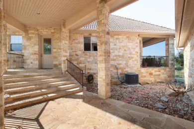 This stunning home in Horseshoe Bay West is perched on two on Ram Rock Golf Course in Texas - for sale on GolfHomes.com, golf home, golf lot