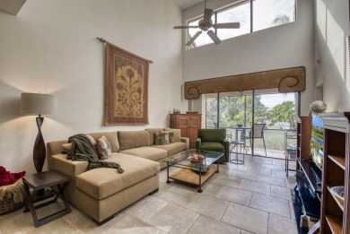 This charming 3-bedroom, 2.5-bathroom home with a tastefully on PGA National Golf Club in Florida - for sale on GolfHomes.com, golf home, golf lot