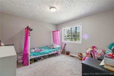 Welcome to this Gray's Creek tri-level cutie! On the main floor on Cypress Lakes Golf Course in North Carolina - for sale on GolfHomes.com, golf home, golf lot