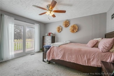 Welcome to this Gray's Creek tri-level cutie! On the main floor on Cypress Lakes Golf Course in North Carolina - for sale on GolfHomes.com, golf home, golf lot