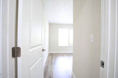 LUXURY IN GATED GOLF COMMUNITY - 3BR/2BA END UNIT | 128-B Golden on The Club At Pelican Bay - North Course in Florida - for sale on GolfHomes.com, golf home, golf lot
