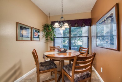 This charming 3-bedroom, 2.5-bathroom home with a tastefully on PGA National Golf Club in Florida - for sale on GolfHomes.com, golf home, golf lot