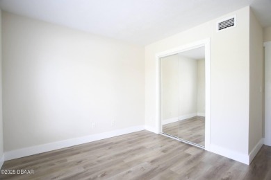 LUXURY IN GATED GOLF COMMUNITY - 3BR/2BA END UNIT | 128-B Golden on The Club At Pelican Bay - North Course in Florida - for sale on GolfHomes.com, golf home, golf lot
