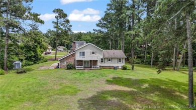 Welcome to this Gray's Creek tri-level cutie! On the main floor on Cypress Lakes Golf Course in North Carolina - for sale on GolfHomes.com, golf home, golf lot